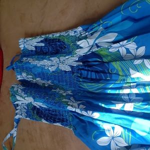 Hawaiian dress about a size large in girls.
